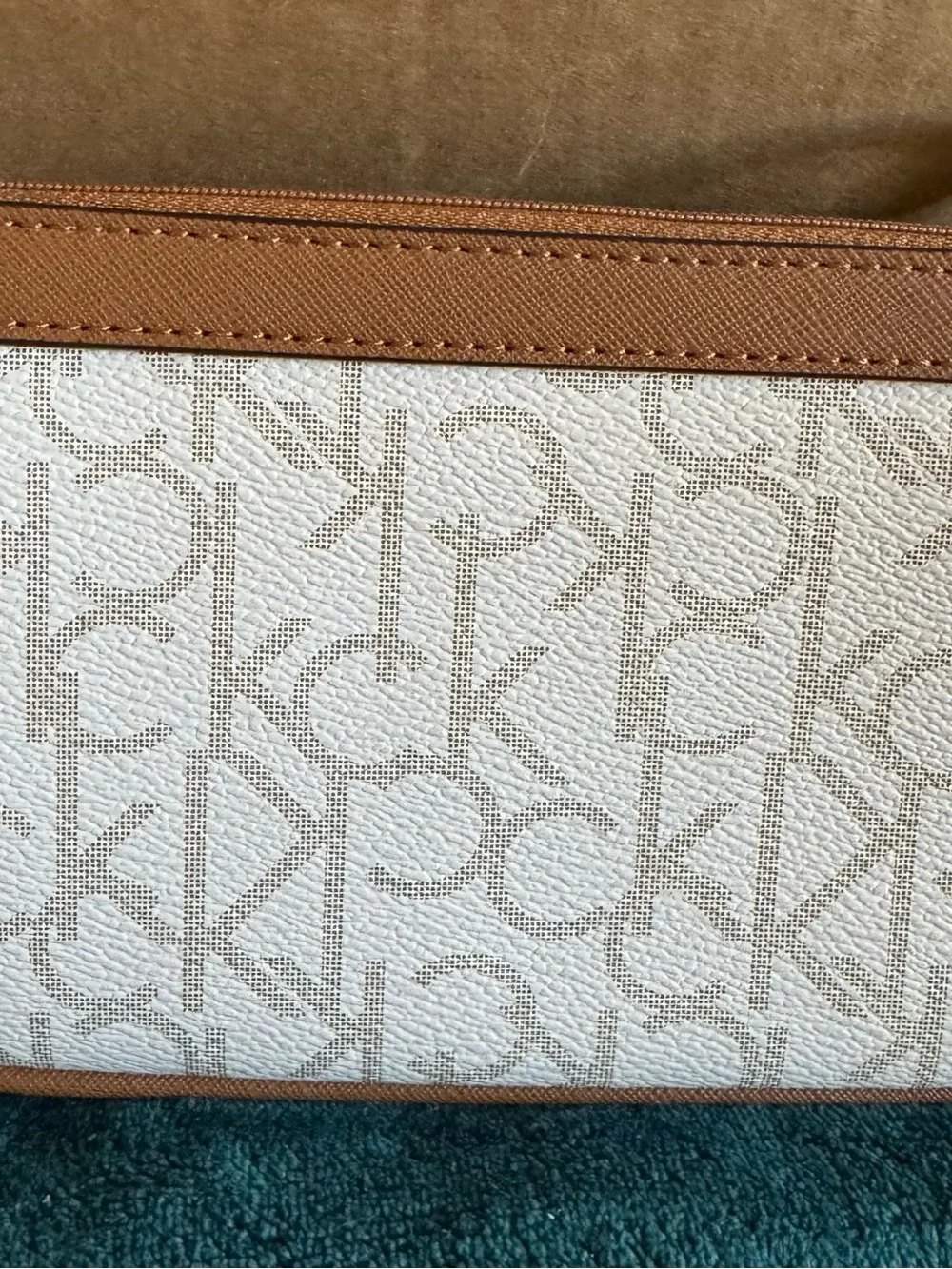 Calvin Klein White & Tan Logo wristlet with Gold Hardware